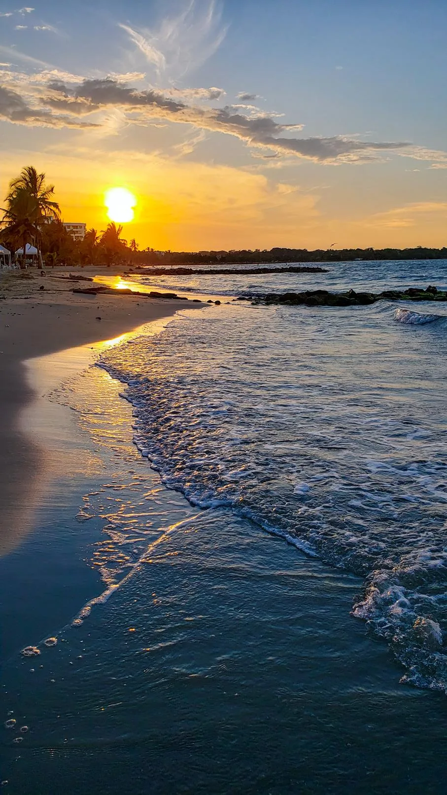 Zonsondergang strand Colombia vakantie